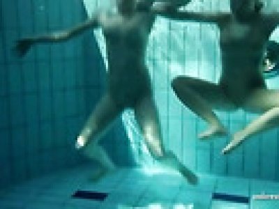 Bikini ladies strip naked and play in the pool