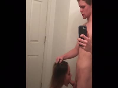 Teen sucking boyfriends penis in bathroom