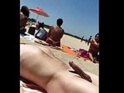 Cumming on the beach in front of naked woman (not mine)