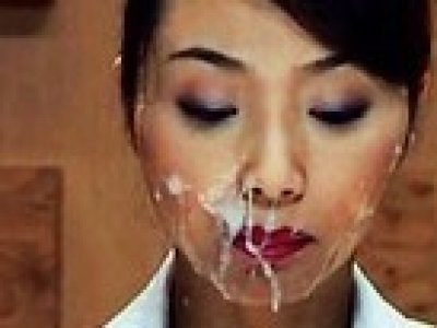 Japanese whore reads the news with cum on her face