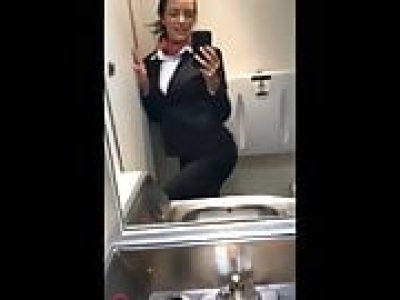 Naughty chubby stewardess playing with her pussy in restroom