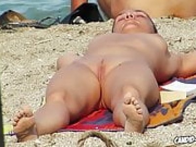 Hot and horny nudists having pleasant at beach spied by voyeurr