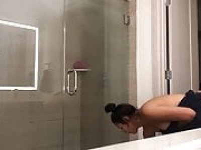 Sexy latina undresses and showers