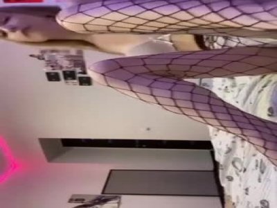 beautiful blonde in fishnets playing with her cunt