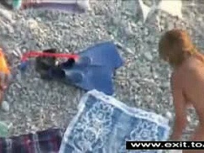 Spying on wife Couples on the beach