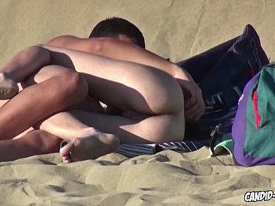 Hot and horny nudists having pleasant at beach spied by voyeurr