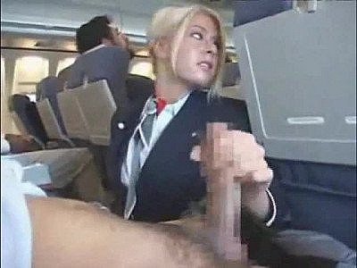 Beauty on a plane giving a handjob