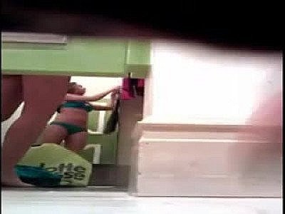Spying booty teen in a fitting room