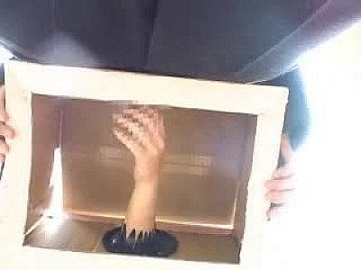Japanese chicks touch his cock in a box