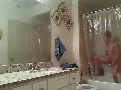 Voyeur slut taking photos and masturbating in the sho