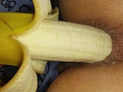 Milf ass takes banana inside