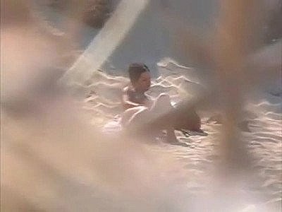 Voyeuring horny nudist slut fingering in public