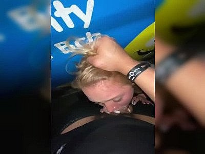 college slut being used for blowjobs behind a van