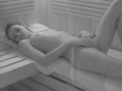 Slim woman filmed in the sauna and drilled